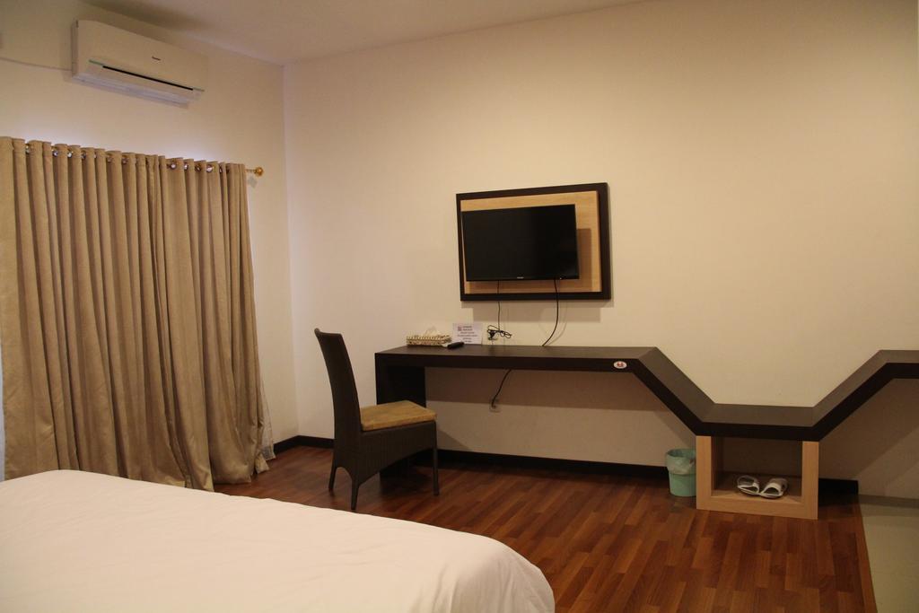 Kampoeng Nelayan Hotel Palu Chambre photo